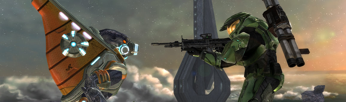 The Master Chief points a gray rifle at a Grunt's head.